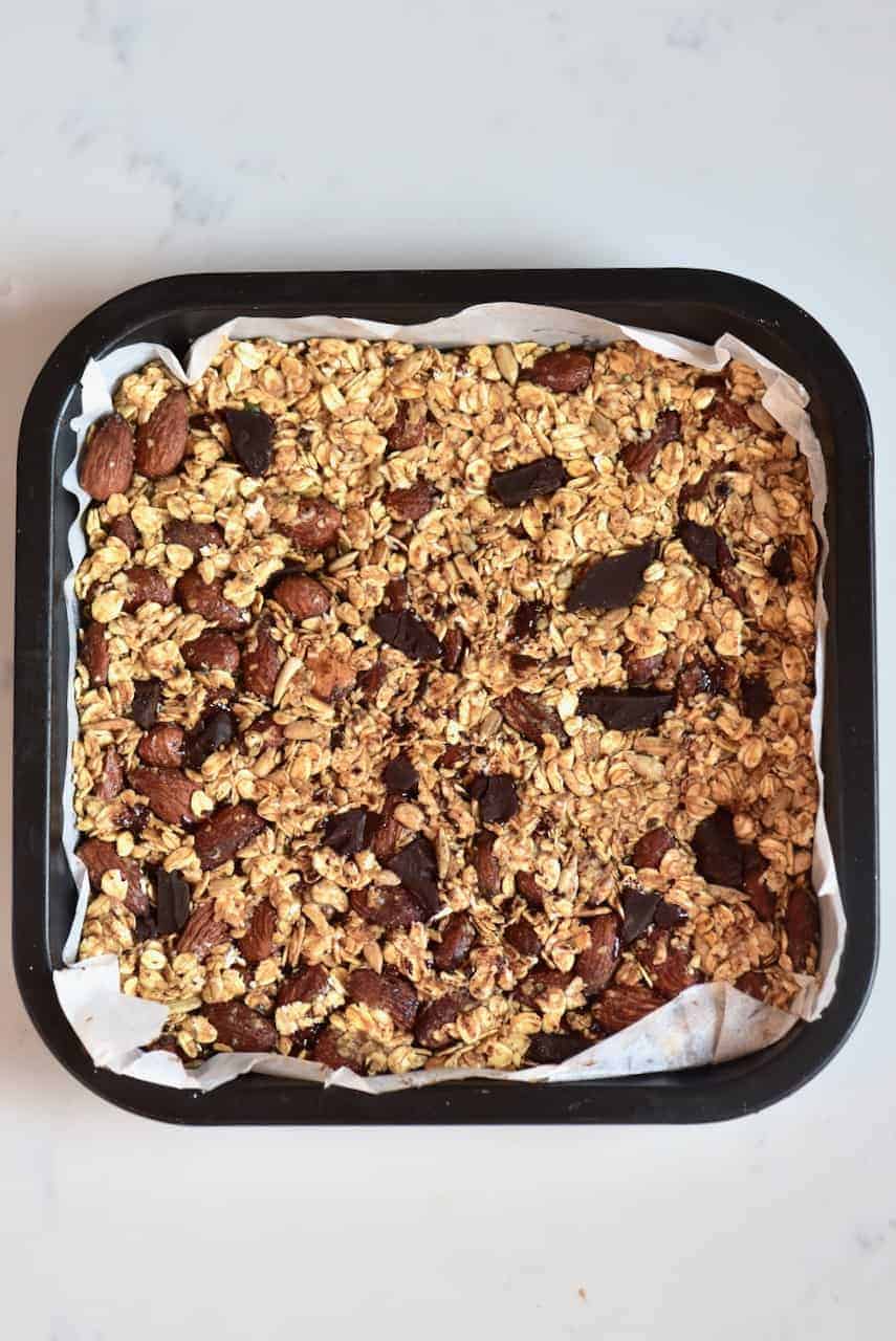 Stacked granola mix in a square tray