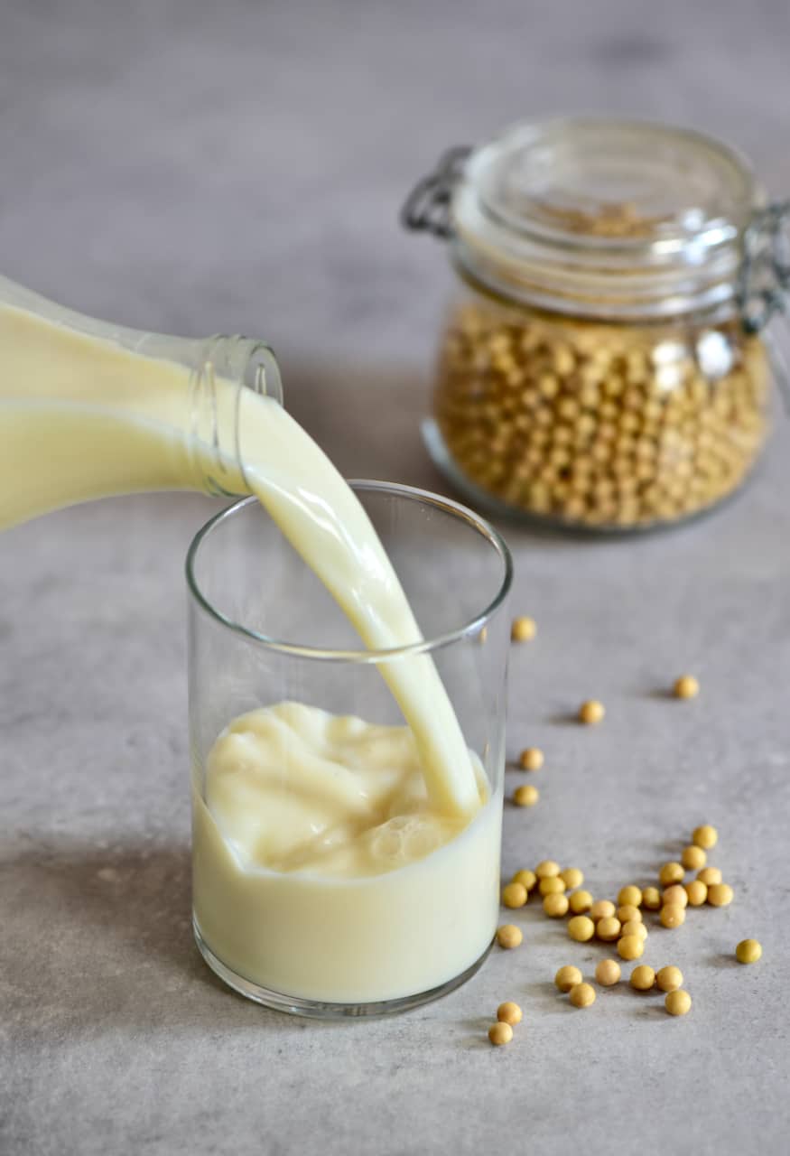 Pouring soy milk in a glass
