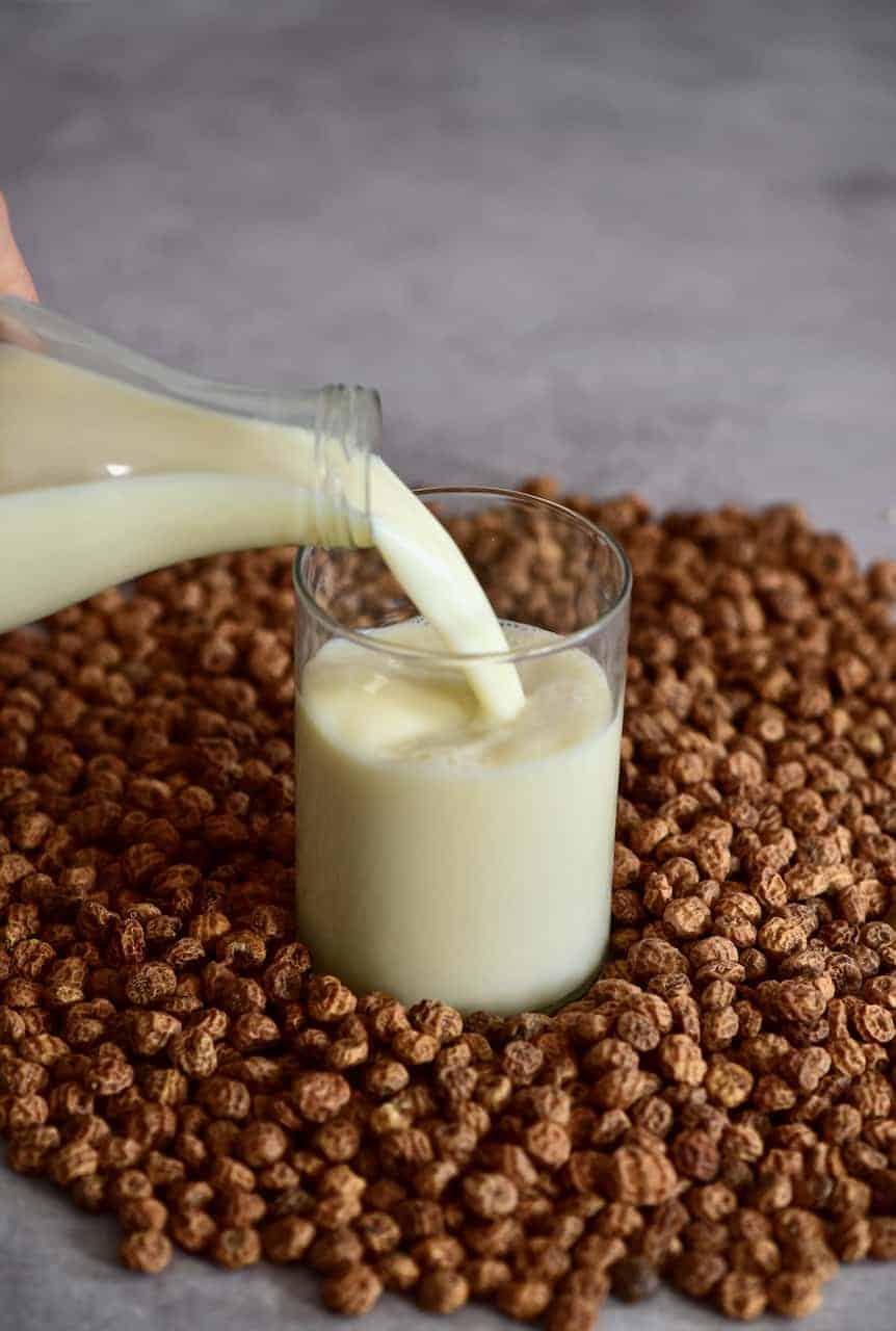 Pouring Tigernut Milk in a glass