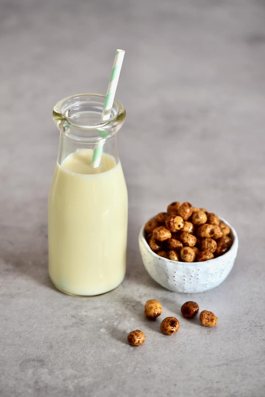 Tigernut Milk in a small bottle with straw