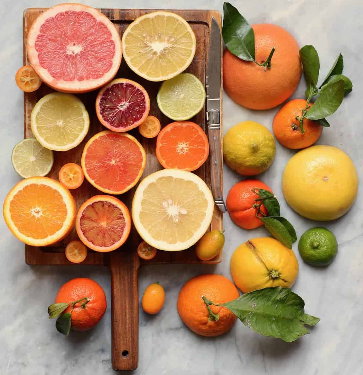 citrus fruits on a wooden board - a wonderful immune boosting foods selection