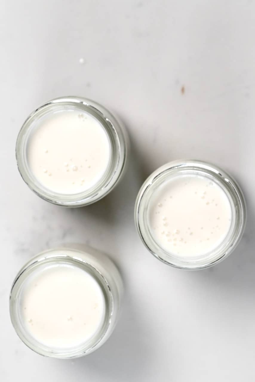 Almond milk in yogurt jars