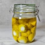 Labneh balls in a glass jar with olive oil