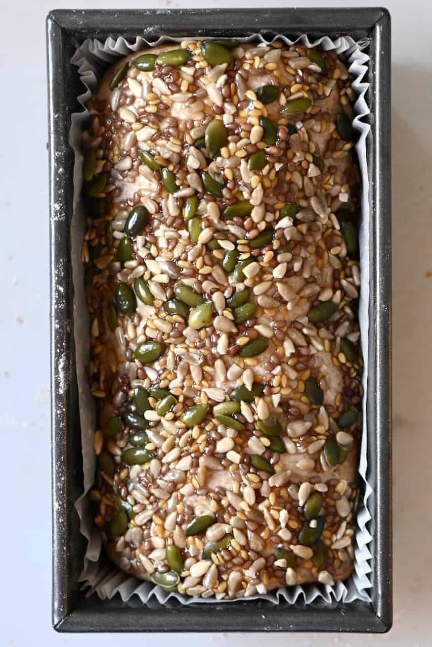 Seeds and grains on top of bread dough