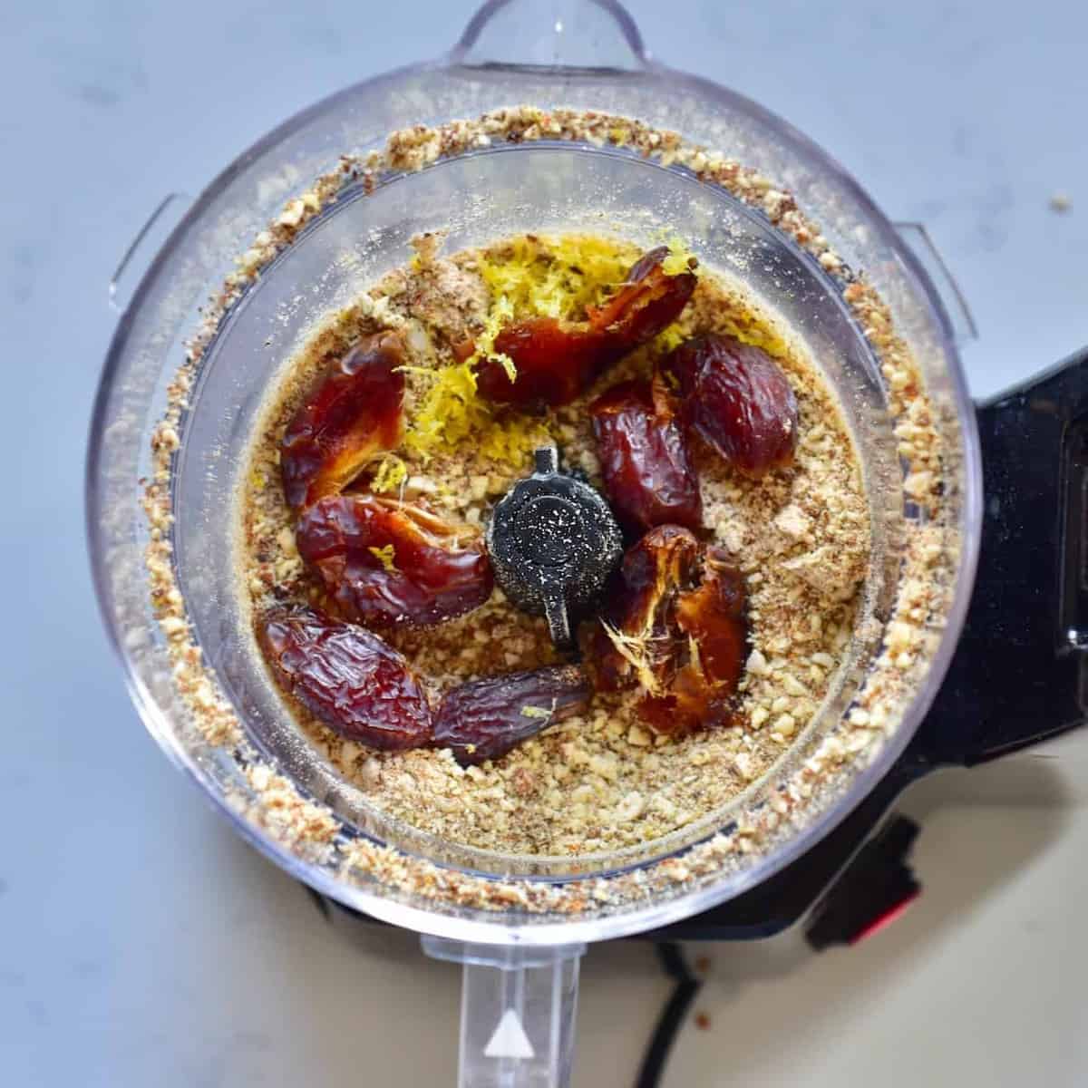 Almond flour and dates in a blender