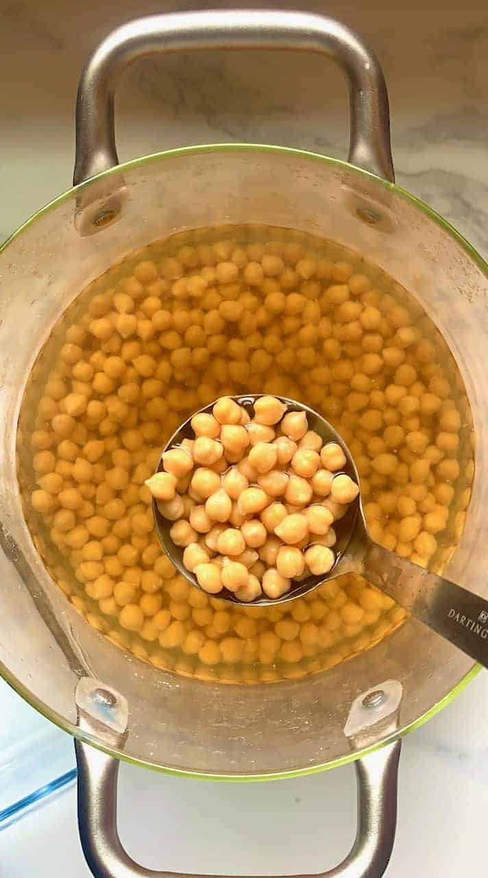 A spoonful of cooked chickpeas