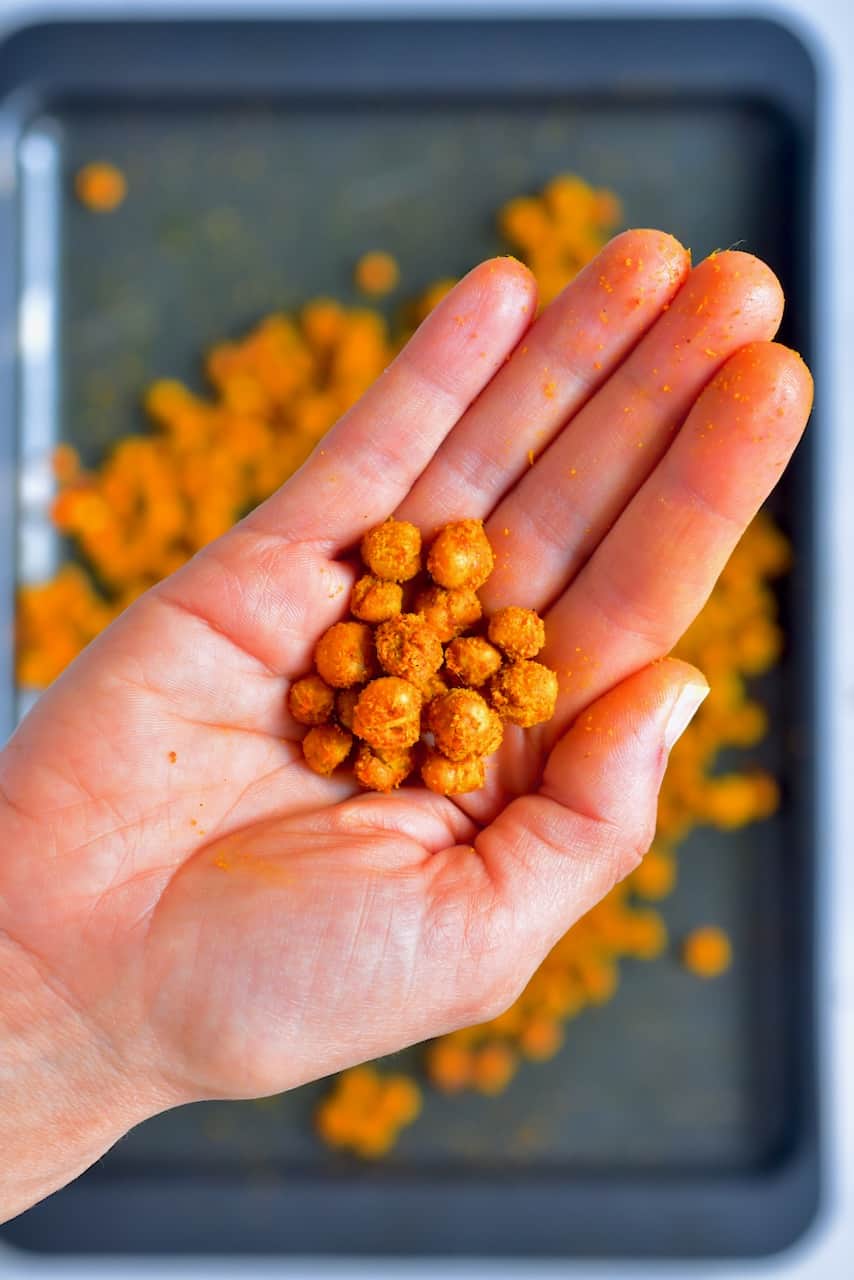 Handful of roasted chickpeas with turmeric