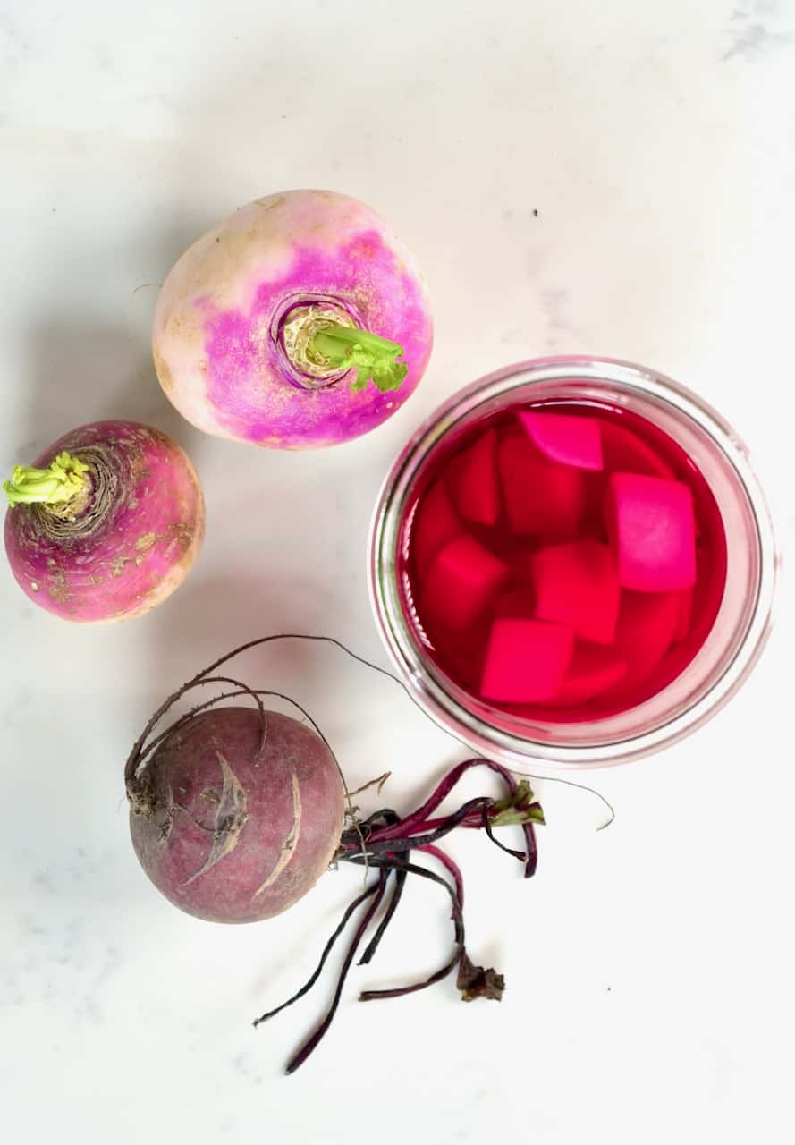 Turnips beetroot and pickled turnips in a jar