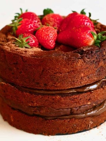 Vegan Gluten Free Chocolate Cake with strawberries on top