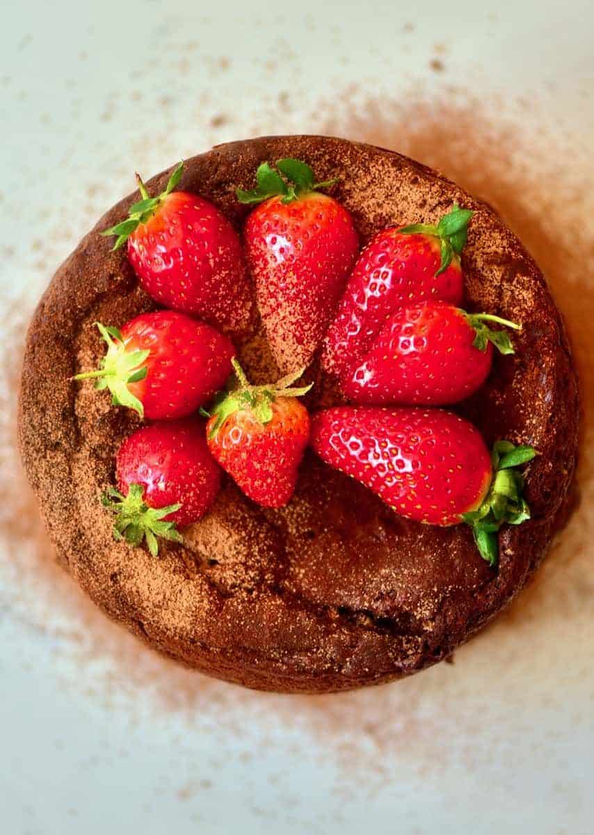 Strawberries on top of chocolate cake