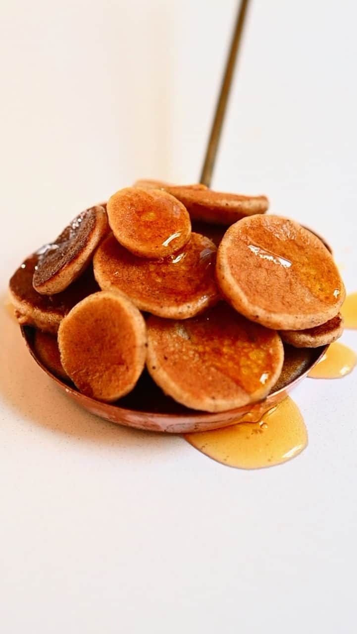 mini pancakes with maple syrup in a pan