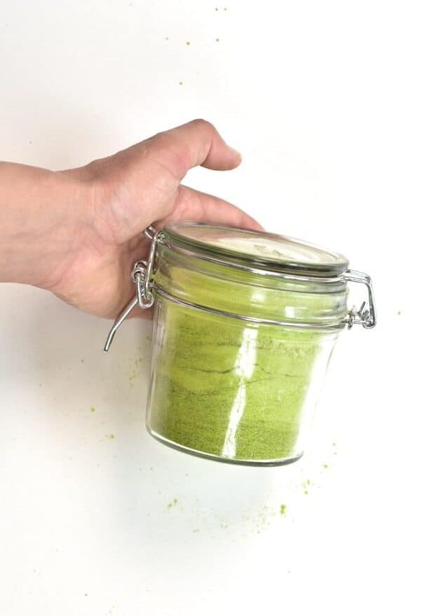 airtight glass jar with green pea powder