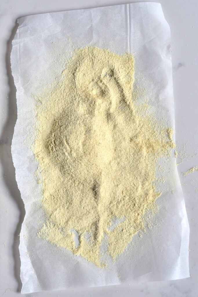 fine ginger powder on a paper sheet