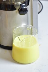 fresh ginger juice in a glass jug