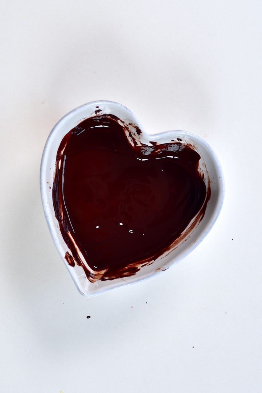melted Milk Chocolate in a heart shaped bowl