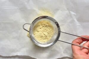 sieving ginger powder