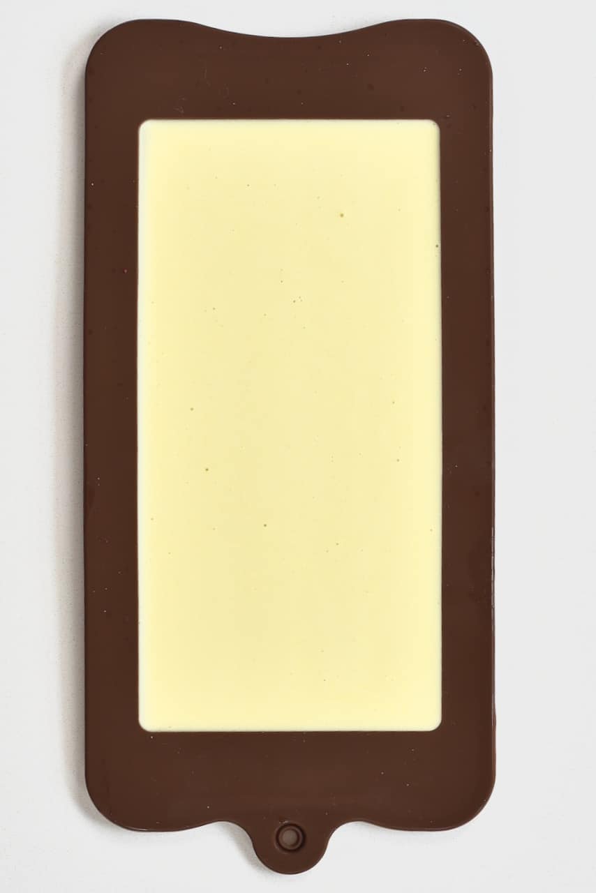 white milk chocolate set in a mold