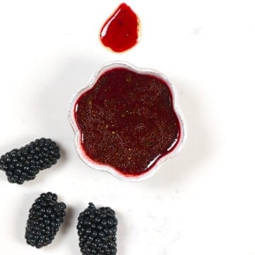 Blackberry salad dressing in a small bowl