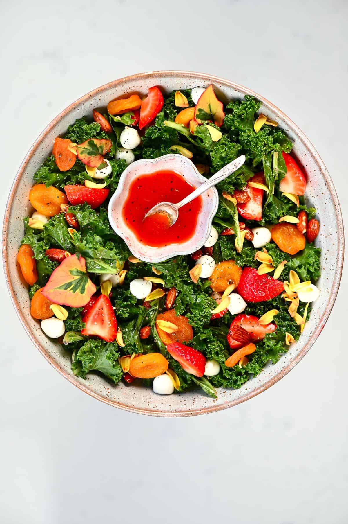 Strawberry Salad bowl with salad dressing