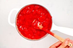 heating Strawberry Jam in a pot