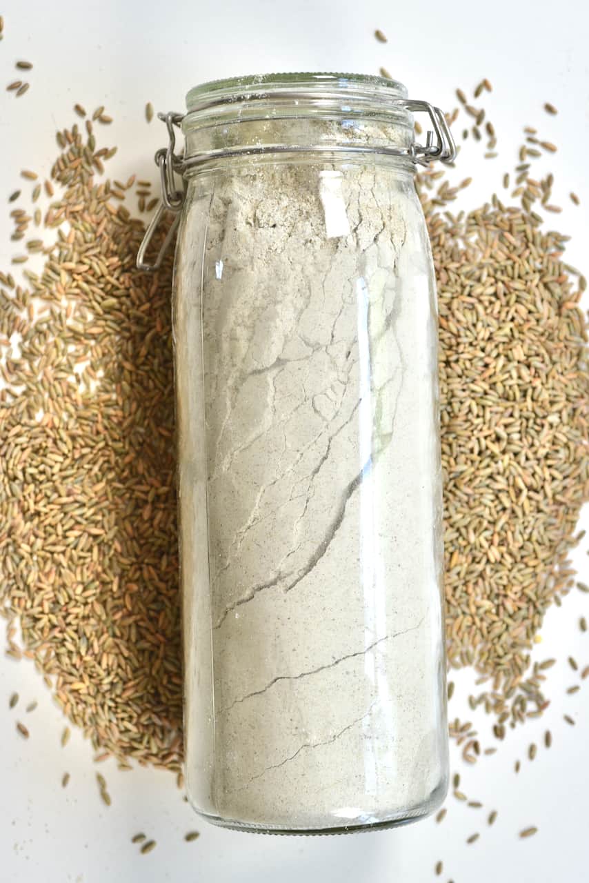 rye glour in a jar and grains around it