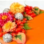 Close up of Goji Berry Tart decorated with edible flowers