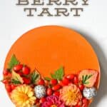 Goji Berry Tart top view decorated with berries and edible flowers