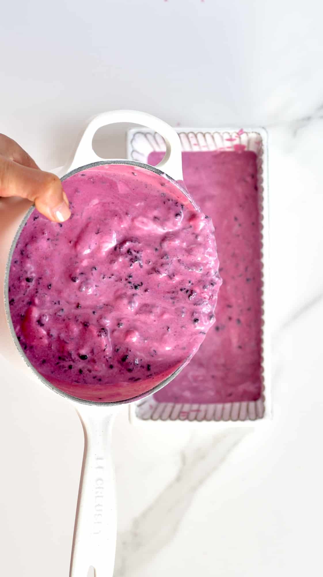 Pouring Blackberry Ice Cream Mixture into a glass tub