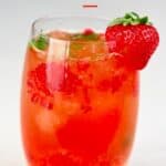 Strawberry Mocktail in a glass with a strawberry