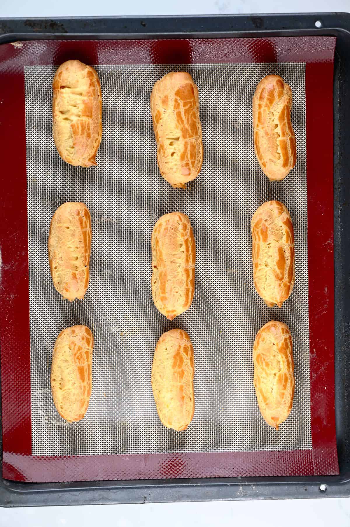 Baked choux pastry in the shape of eclairs