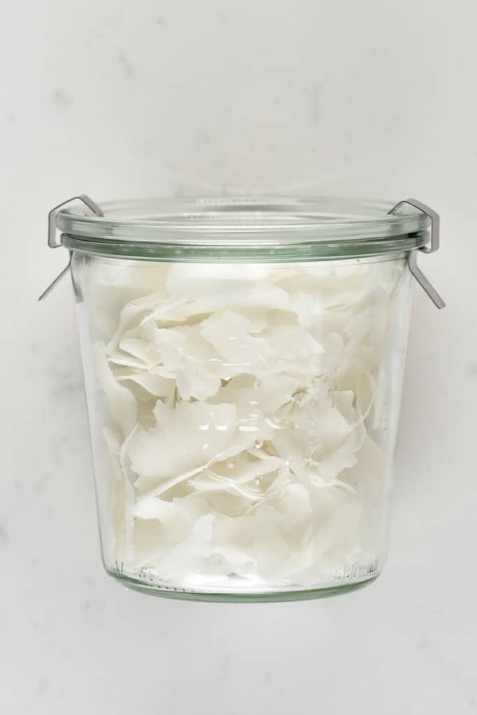 Coconut chips in a closed jar