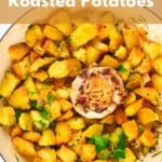 Crispy Roasted Potatoes in a pan with garlic