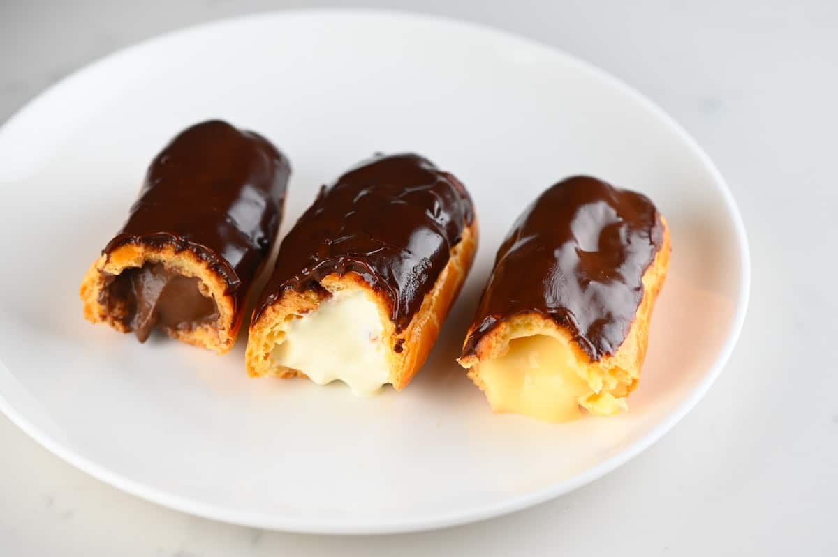 Three eclairs with different fillings