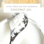 Homemade Extra Virgin Coconut Oil in a small bowl with a spoon