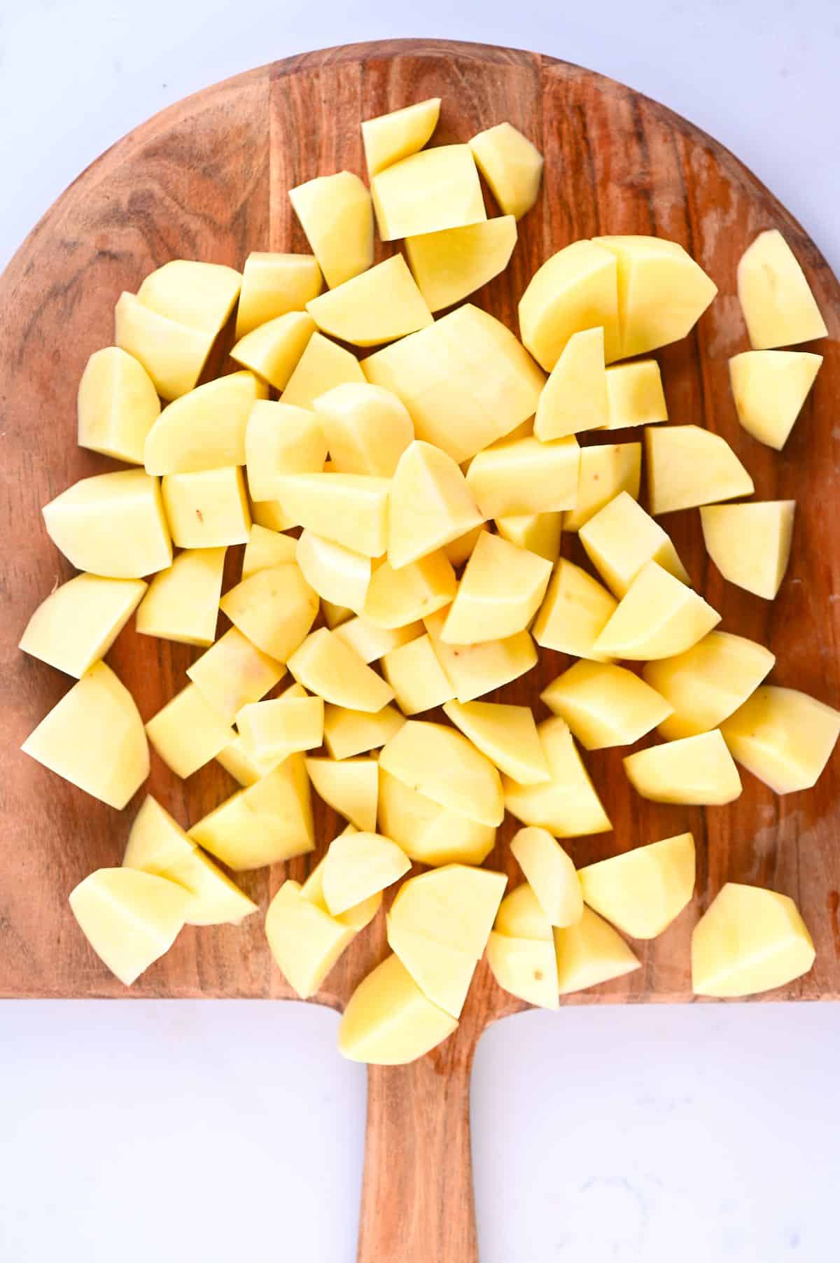 Chopped potatoes on a cutting board