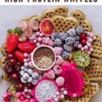 Matcha Waffles topped with frozen fruit and edible flowers