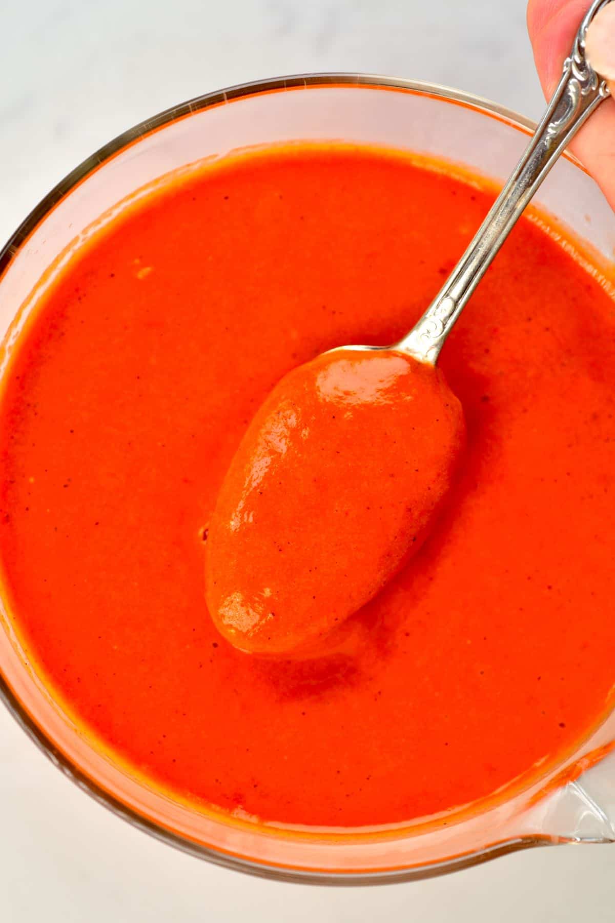 A spoonful of Roasted Red Pepper Sauce