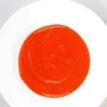 Roasted Red Pepper Sauce served in a white plate