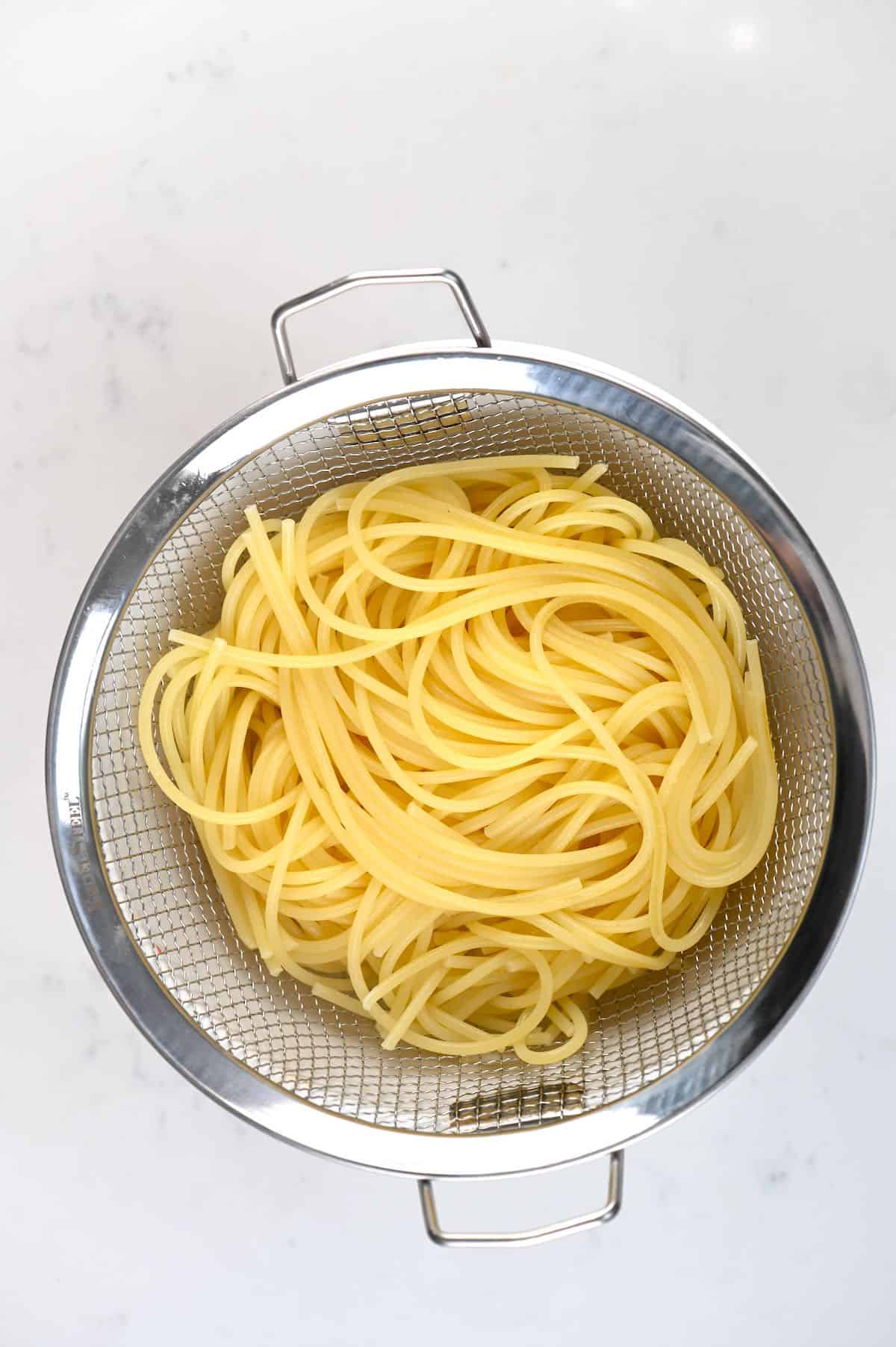 Drained pasta in a colander