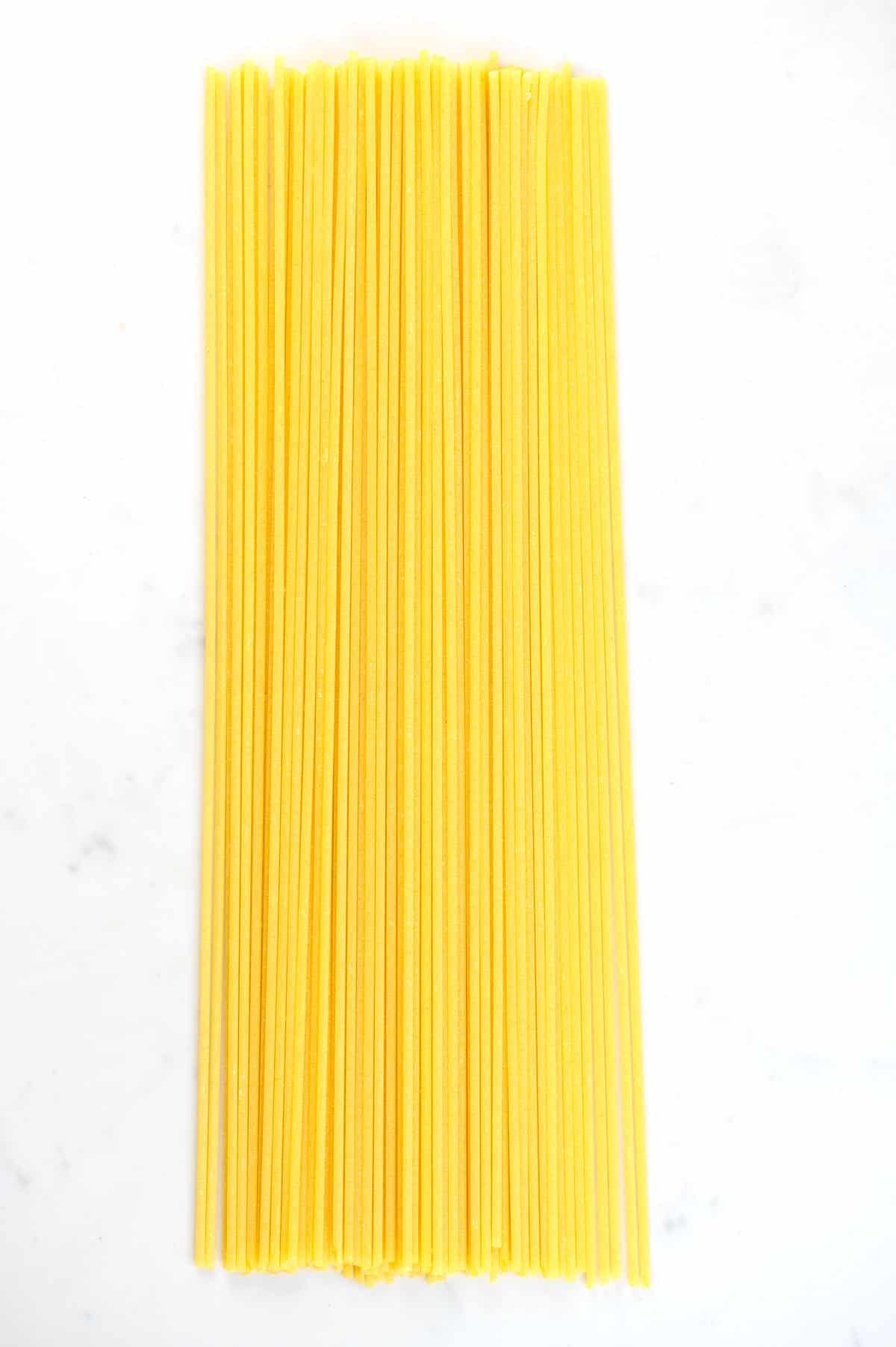 Spaghetti in a flat white surface