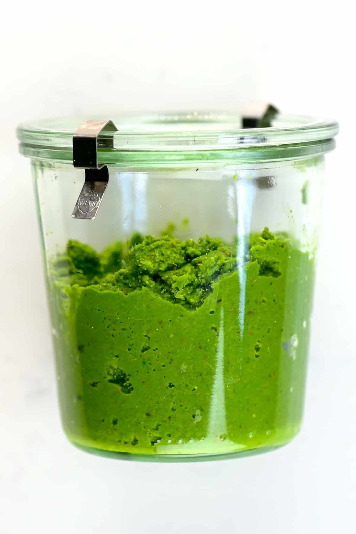 A jar with Thai Green Curry Paste with the lid on