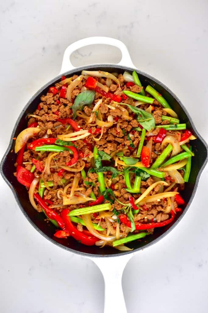 A pan with cooked Thai basil vegan beef with soy mince