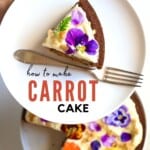 A slice of carrot cake in a place with a fork