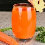 A glass of carrot ginger juice