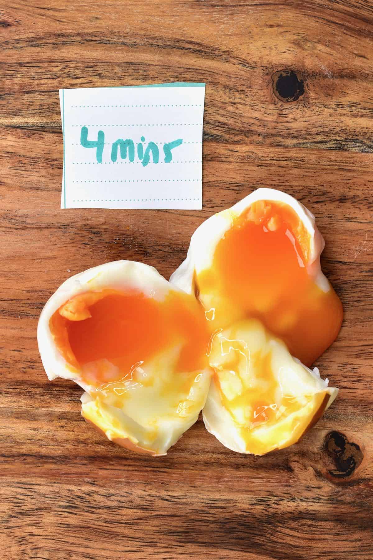Egg boiled for 4 minutes cut in two