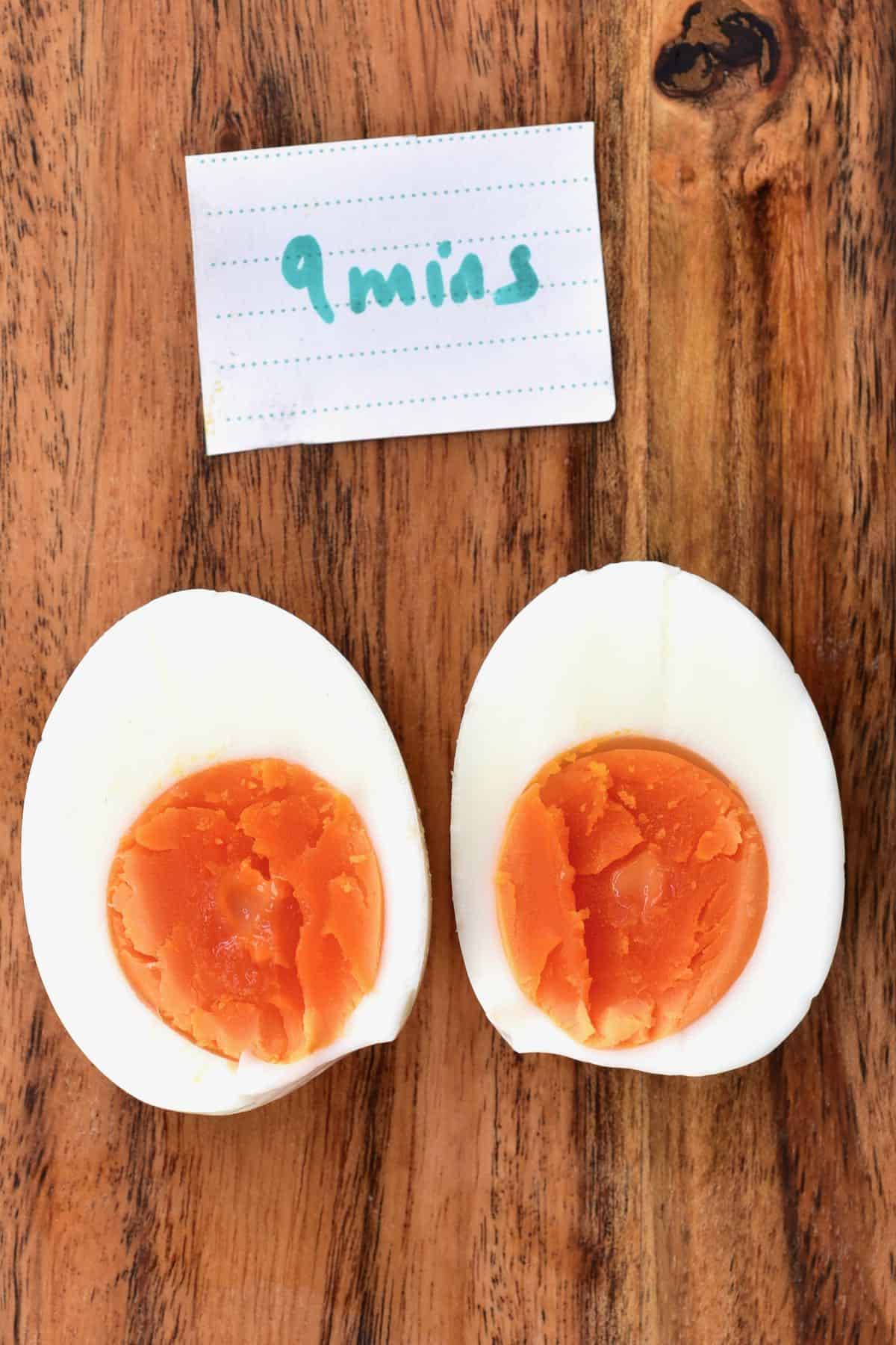 Egg boiled for 9 minutes cut in two