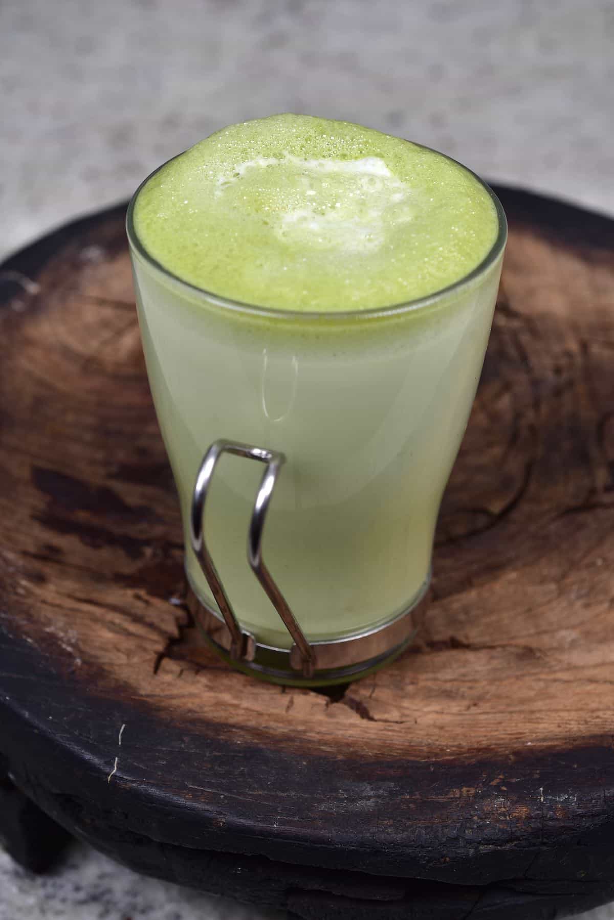 Matcha latte in a tall glass