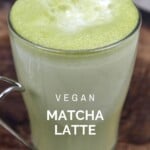 A tall glass with matcha latte