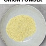 Onion powder in a white bowl