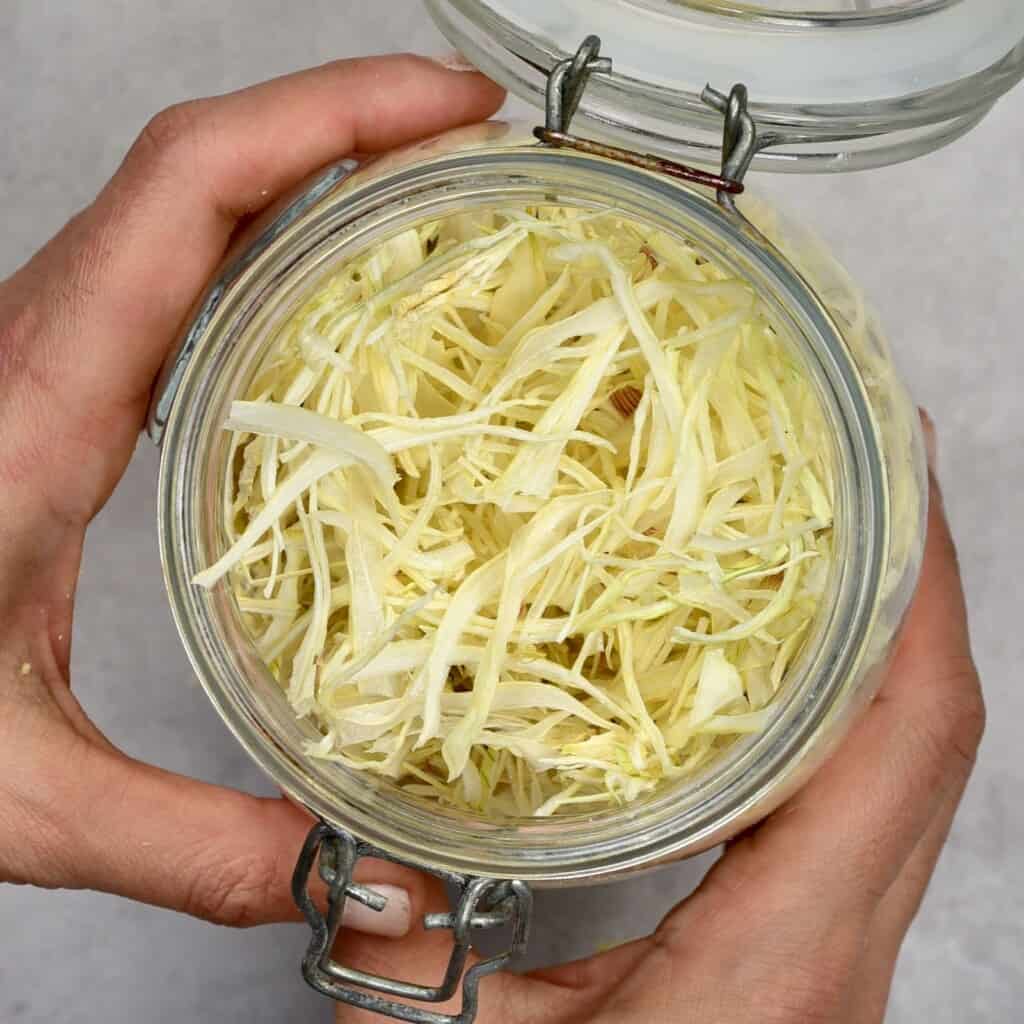 Dried onion flakes in a jar